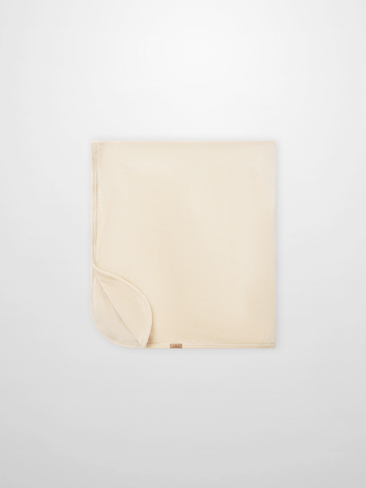 Embroidered Anchor Blanket by Adee; beige ribbed boys swaddle blanket with anchor motif.