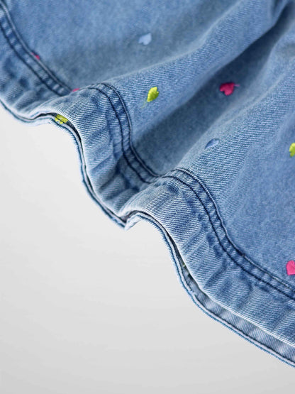 Blue denim fabric with colorful embroidered hearts, Embroidered Heart Denim Skirt.