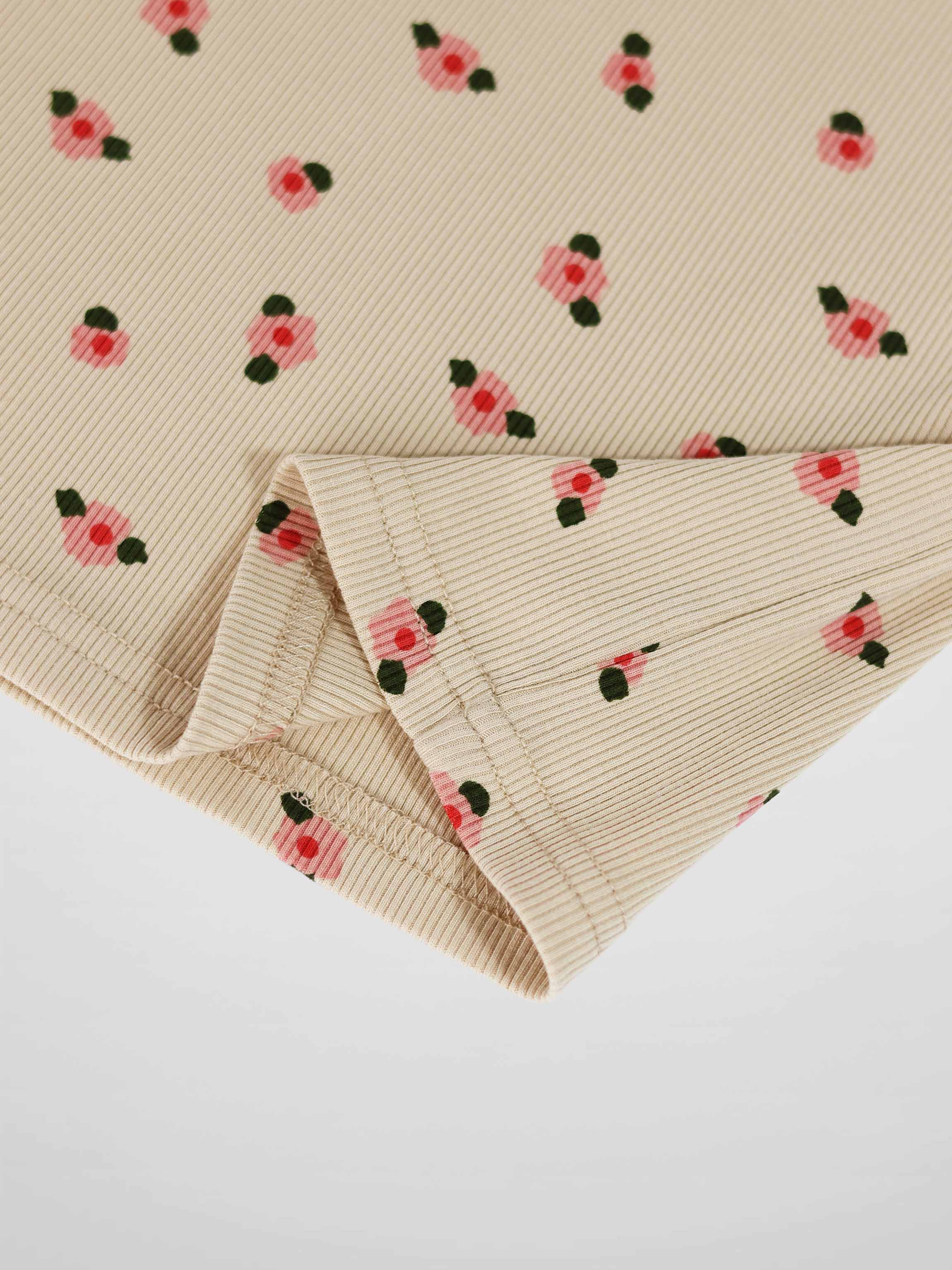 Adee tan floral T-shirt for girls, short sleeves, beige ribbed fabric with pink flowers and green leaves.