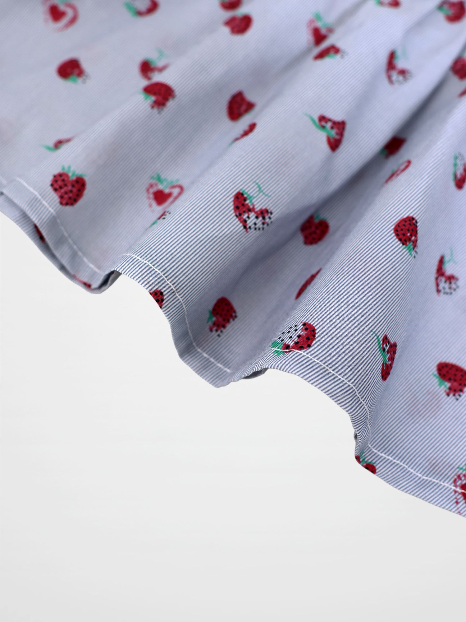 Strawberry Print Skirt by Adee for girls in light blue striped fabric with red strawberries