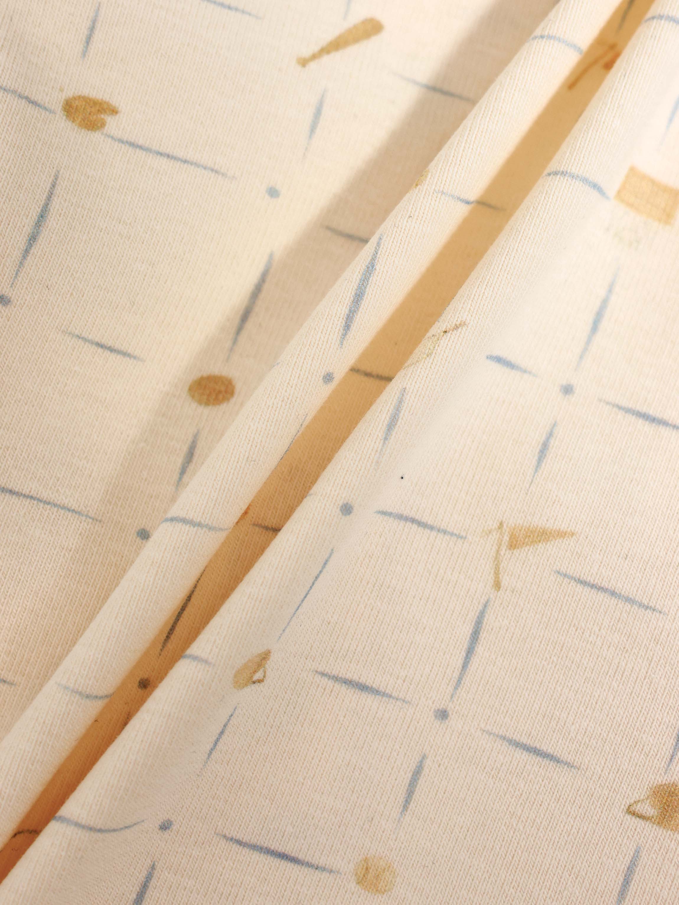 Grand Slam Hat for boys by Adee; beige fabric with pale blue brush-stroke pattern