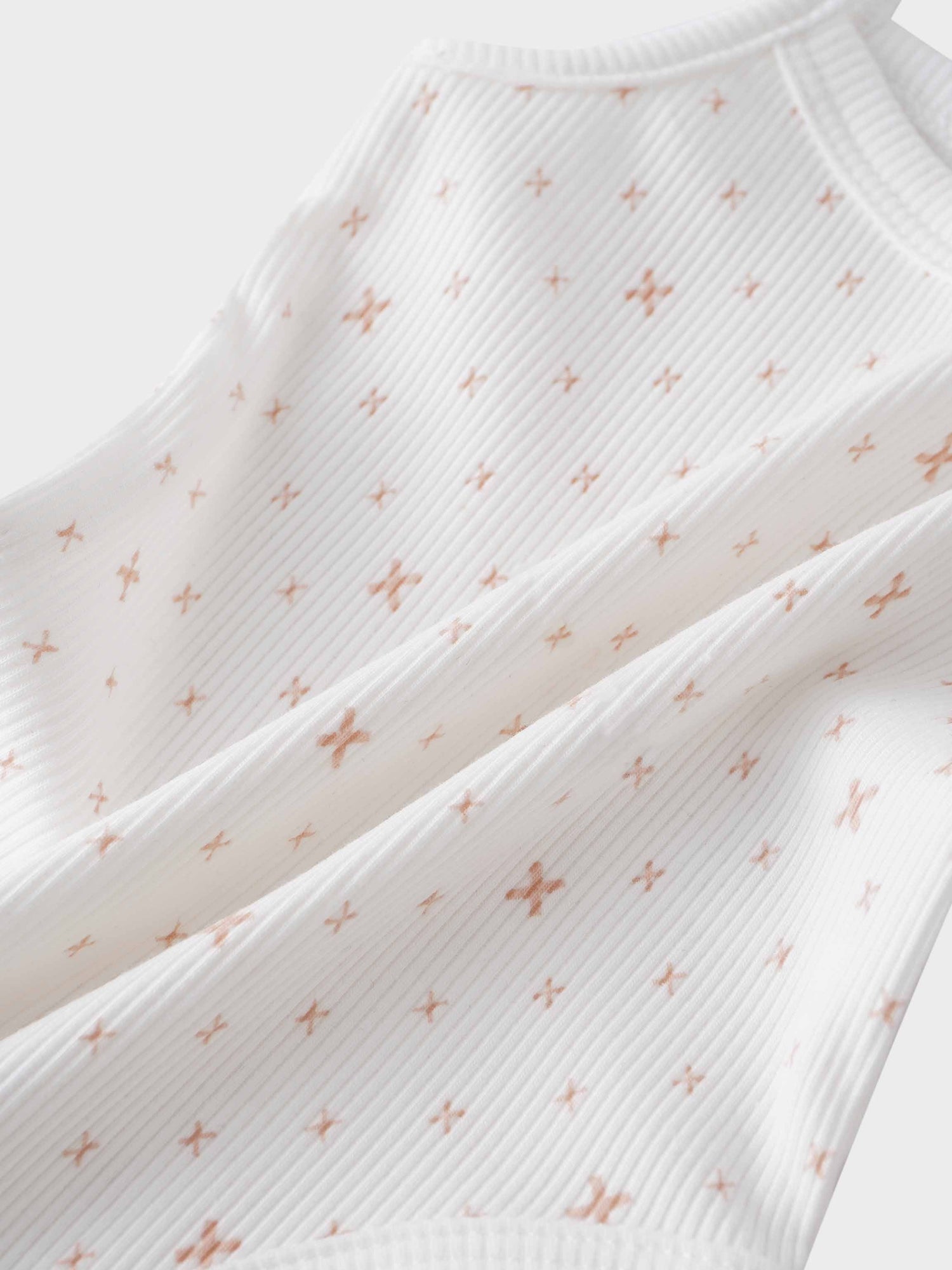Pink diamond pattern bodysuit fabric