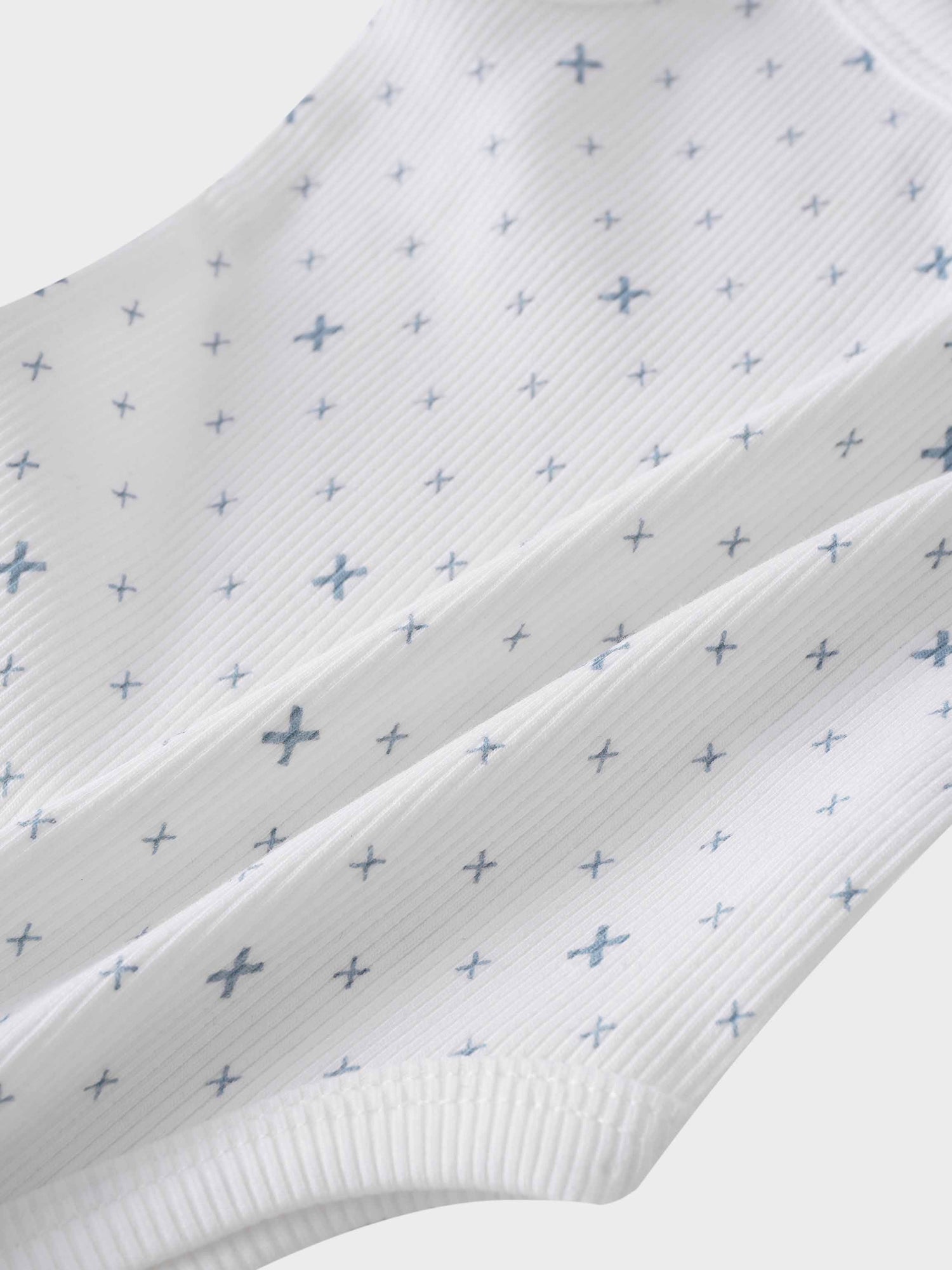 Light blue diamond pattern bodysuit