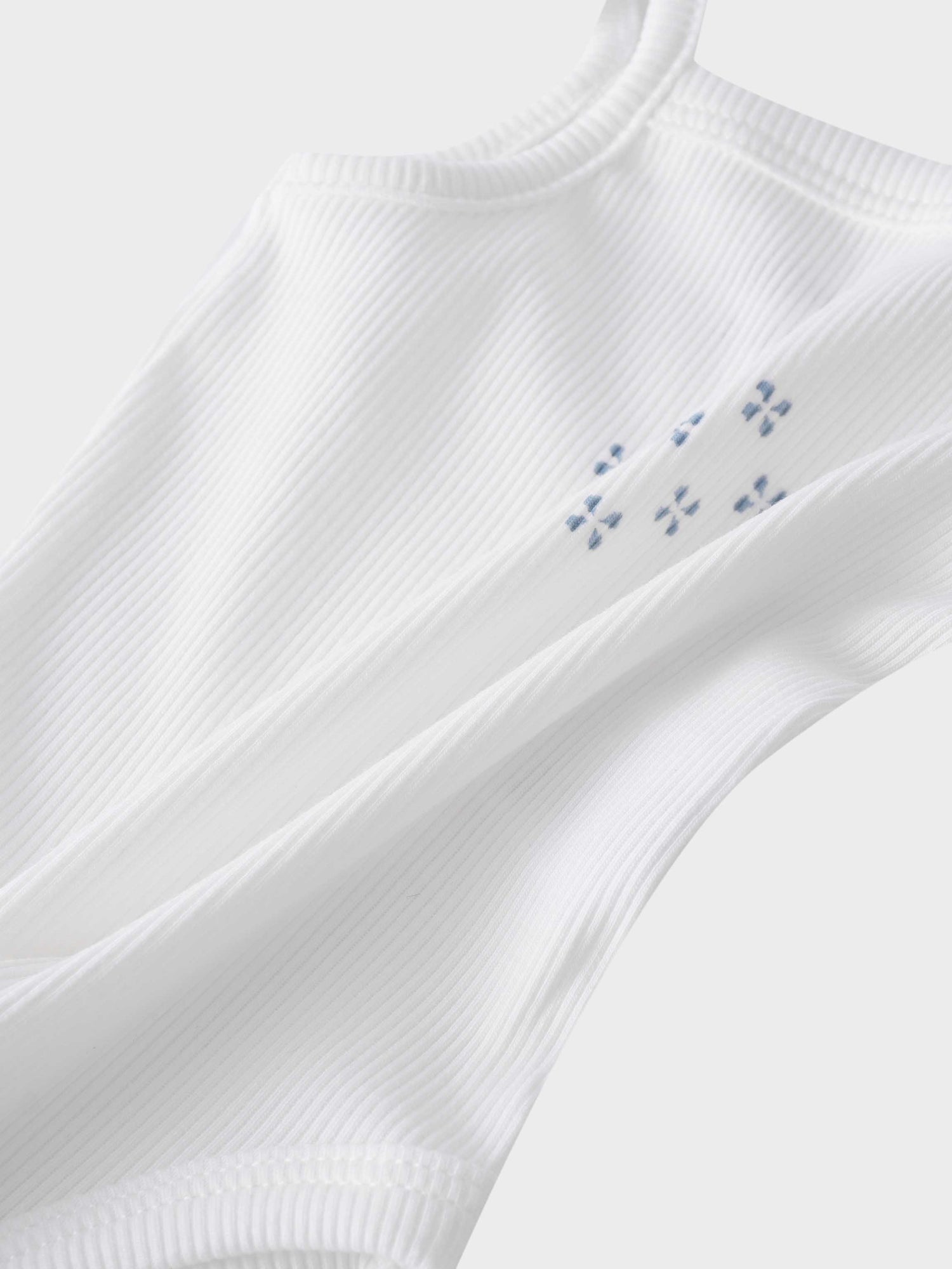 Light blue diamond pattern bodysuit