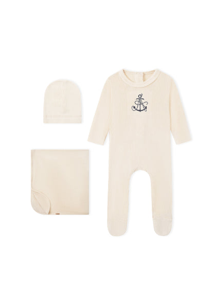 Adee Embroidered Anchor Layette Set in cream; ribbed knit baby onesie with anchor, plus hat and blanket.