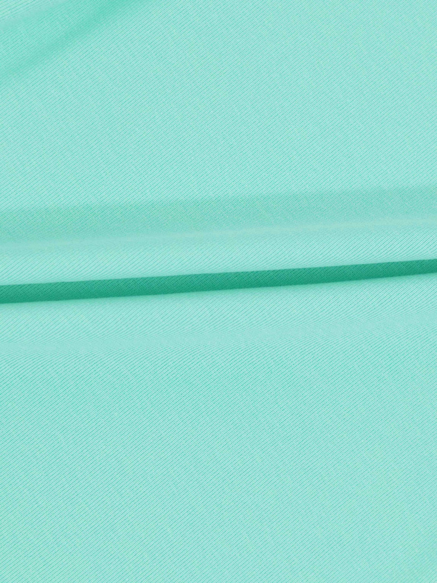 Mint green thin ribbed T-shirt fabric with soft folds.