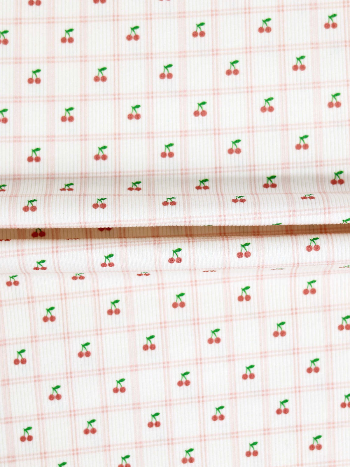 Cherry Window Bonnet for girls; pink grid fabric with tiny red cherries and green stems