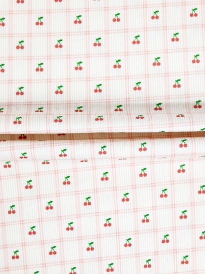 Cherry Window Bonnet for girls; pink grid fabric with tiny red cherries and green stems
