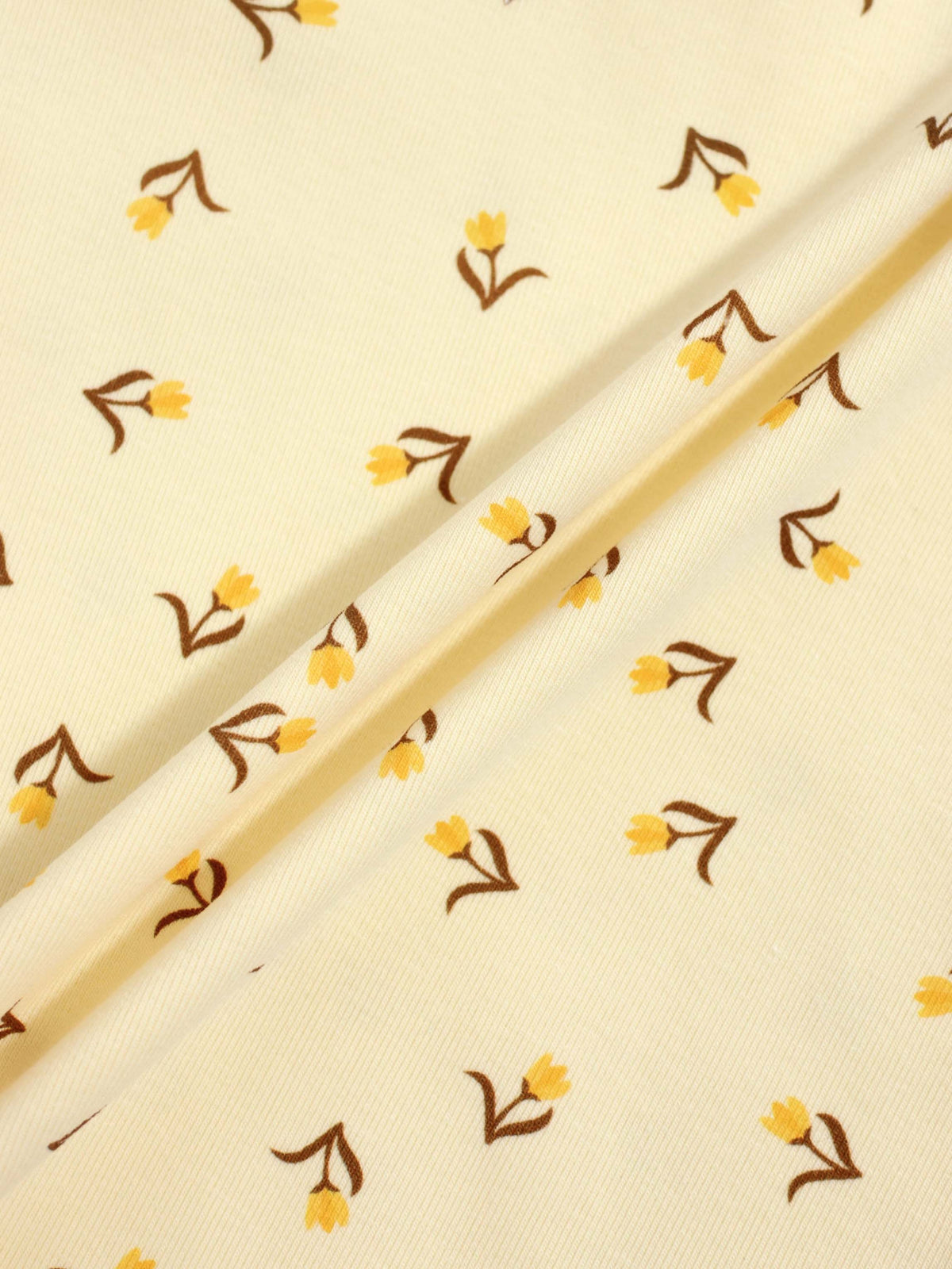 Butter Yellow Tulip 6 Panel Skirt for girls with pale yellow fabric and small yellow tulip print.