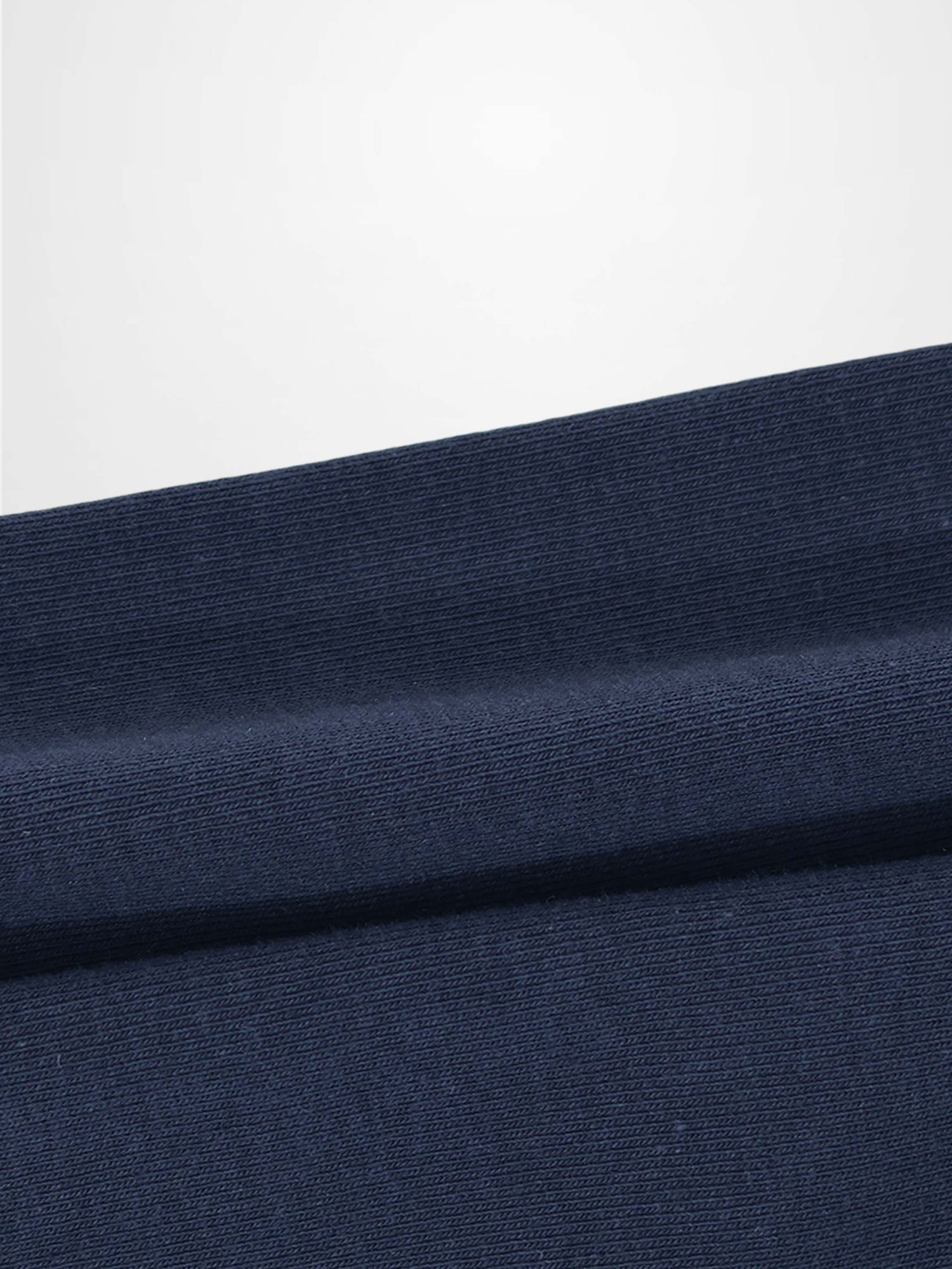 Non ribbed leggings in dark navy knit fabric; unisex basics bottoms