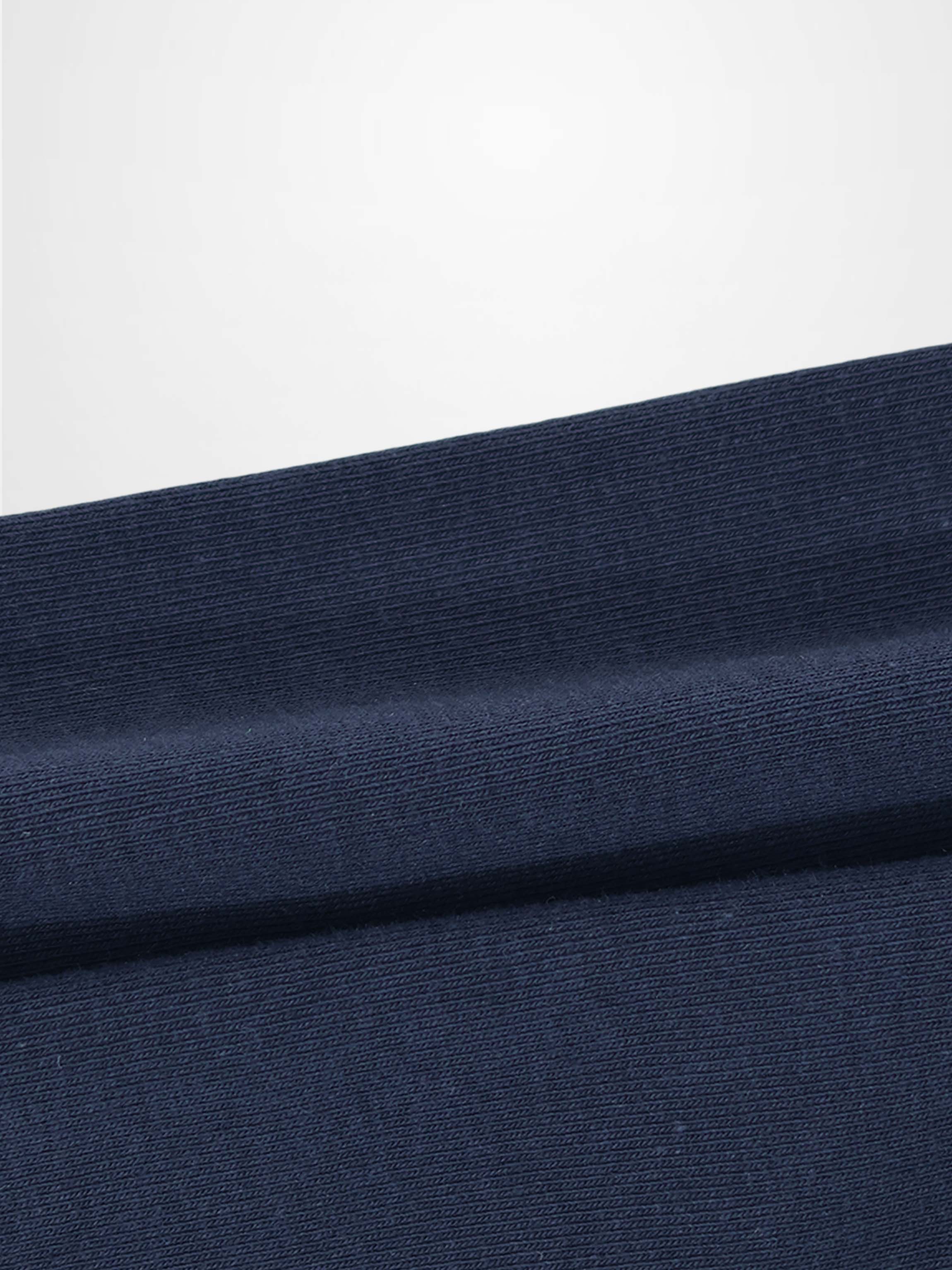 Non ribbed leggings in dark navy knit fabric; unisex basics bottoms