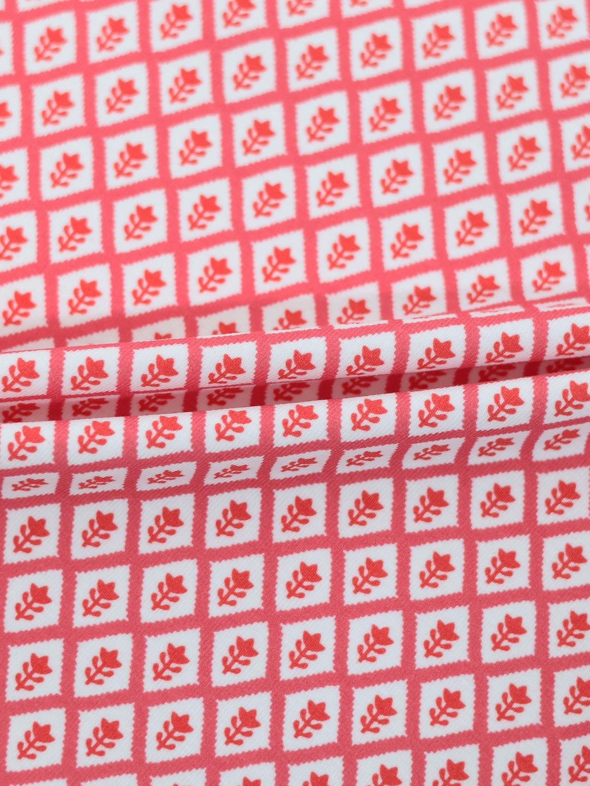 Diamond Flower T-Shirt Adee; red and white diamond grid pattern with leaf motif.
