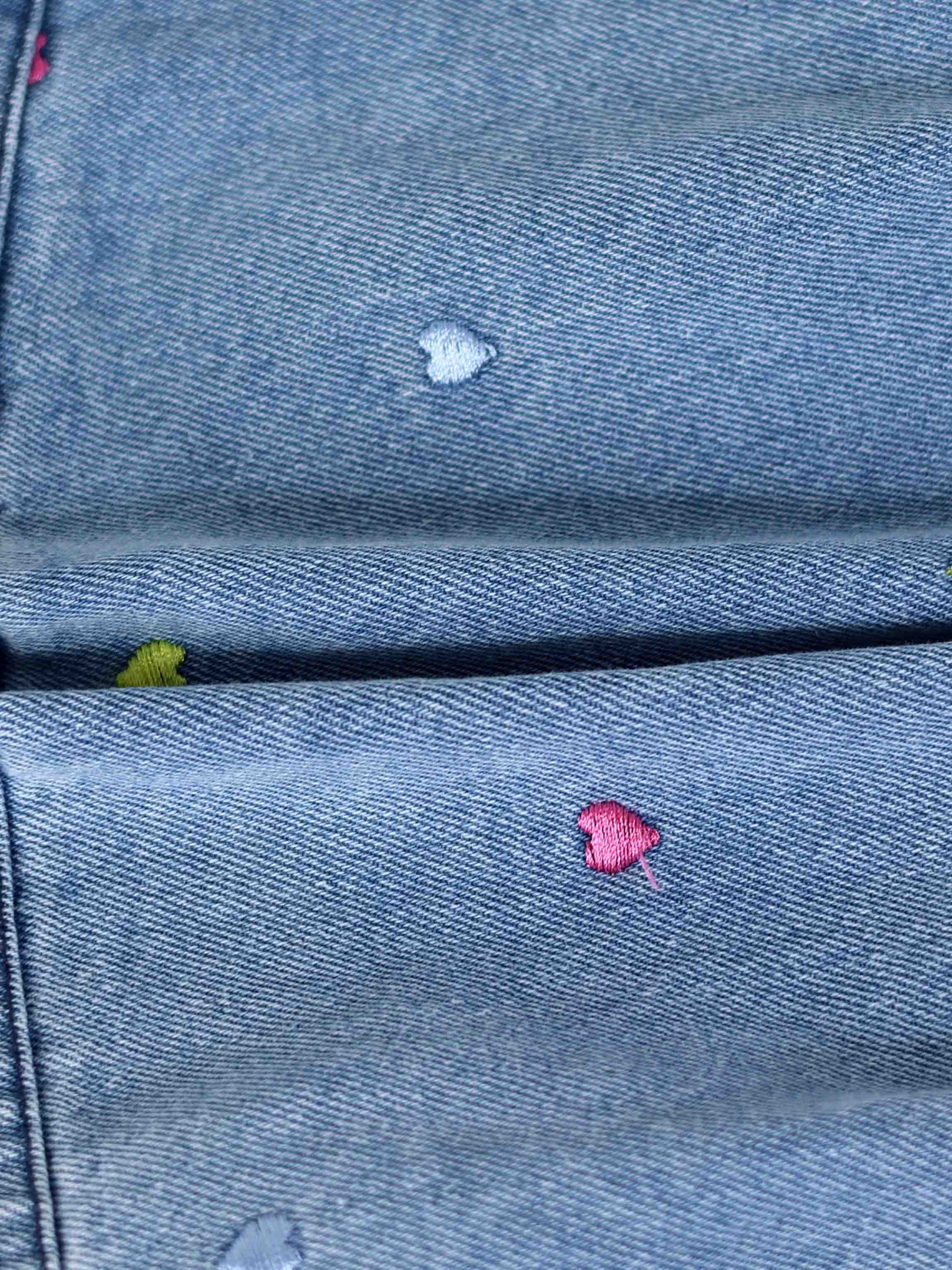 Embroidered Heart Denim Skirt: blue denim with tiny multicolored heart embroidery.