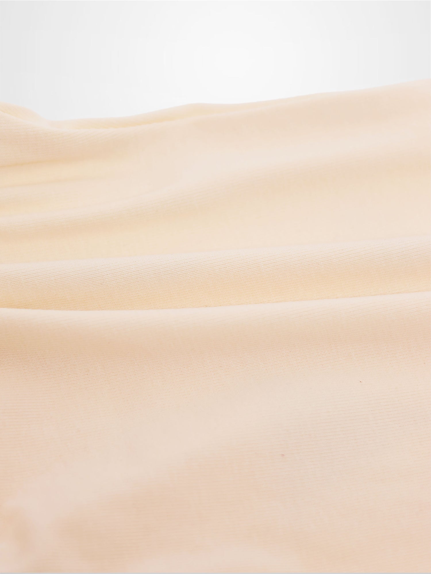Sail Boat Romper by Adee; peach fabric close-up for boys romper