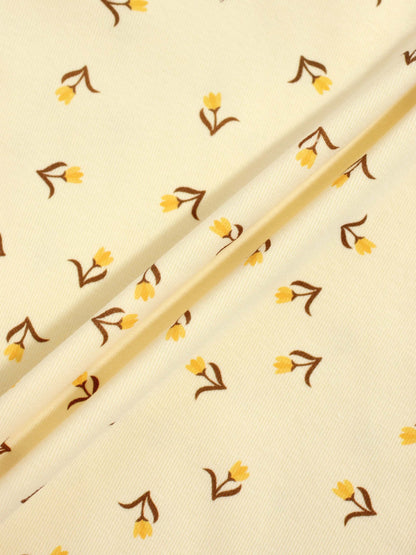 Butter Yellow Tulip Short Sleeve T-Shirt &amp; Shorts Set fabric with yellow tulip motifs