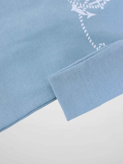 Blue Anchor Stretchy baby jumpsuit sleeve cuff in light blue fabric with white rope-anchor print.