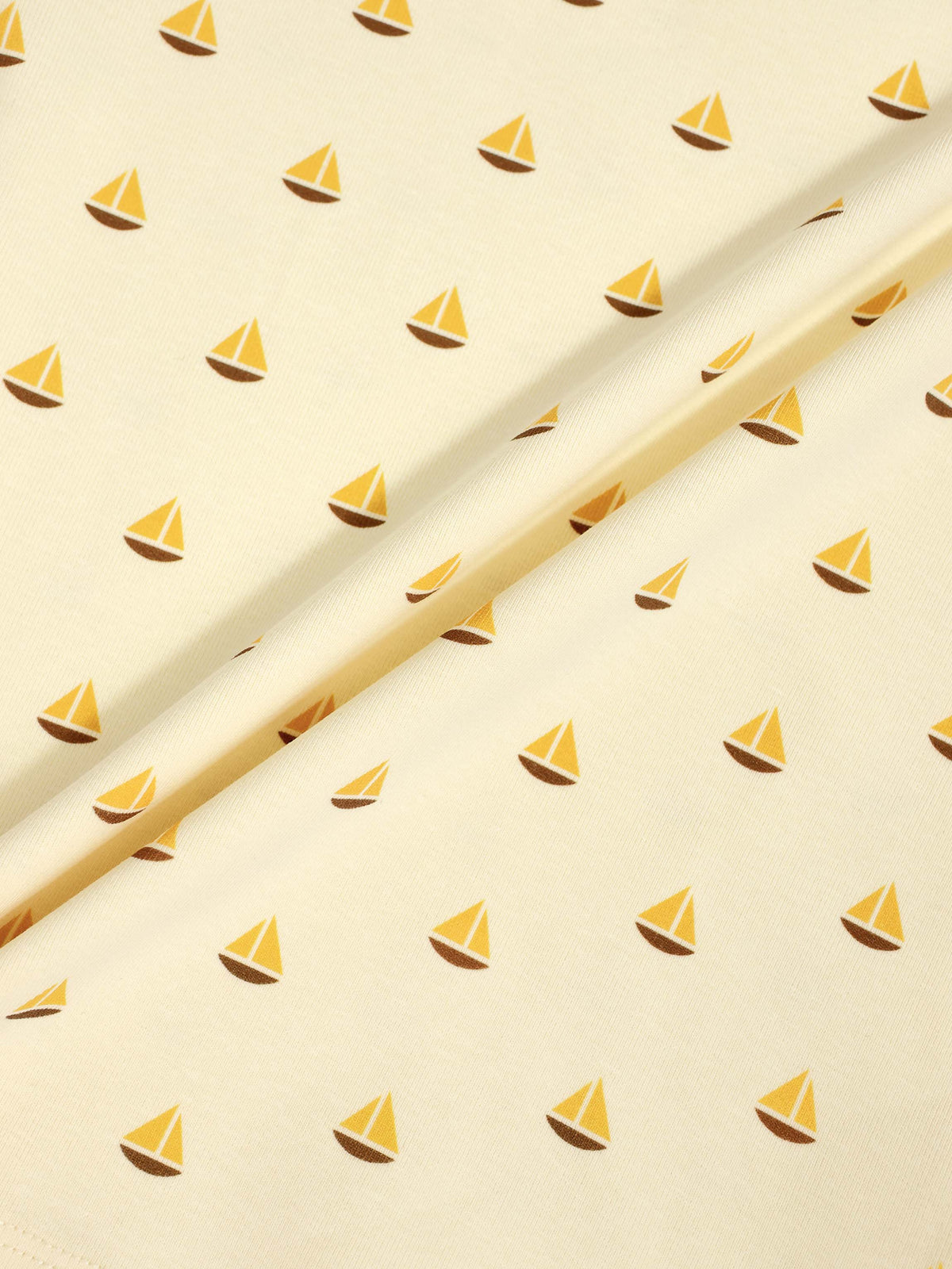 Boat Print Set fabric for little boys by Adee; pale yellow with small yellow sailboats pattern.