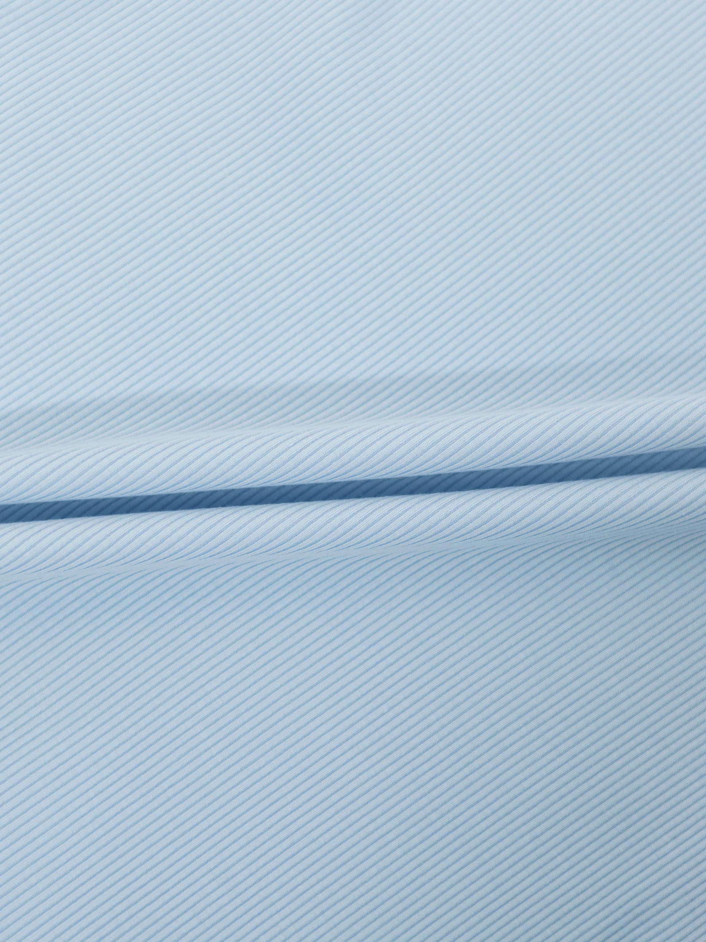 Light blue striped fabric for a 3/4 puff sleeve T-shirt.