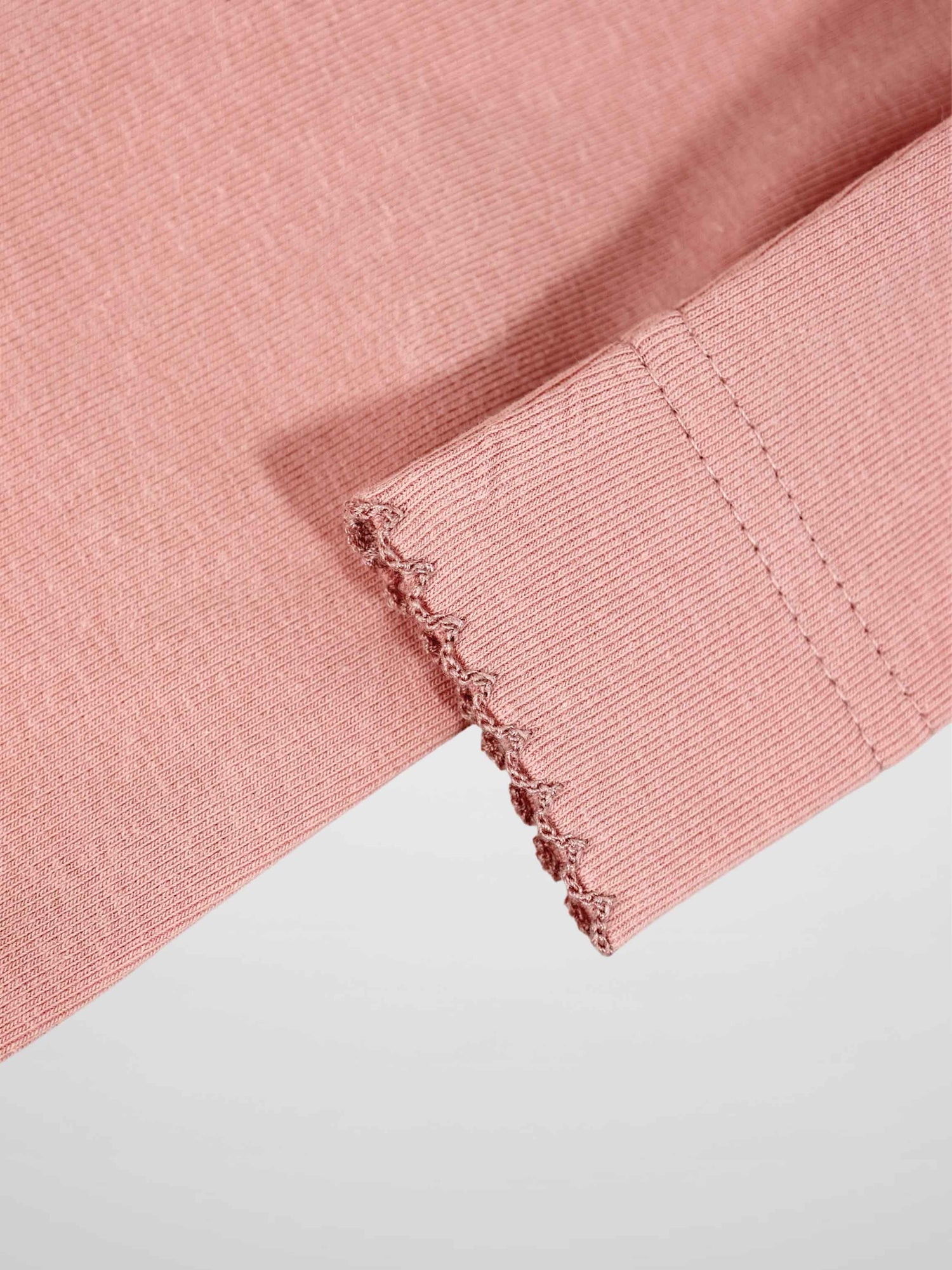 Pink Bow Stretchy with Lace Girls Stretchies cuff in dark pink knit with scalloped lace trim