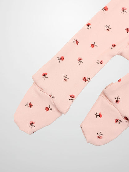 Adee Pink Petal Stretchy girls stretchies long-sleeve top with pale pink fabric and tiny red floral print
