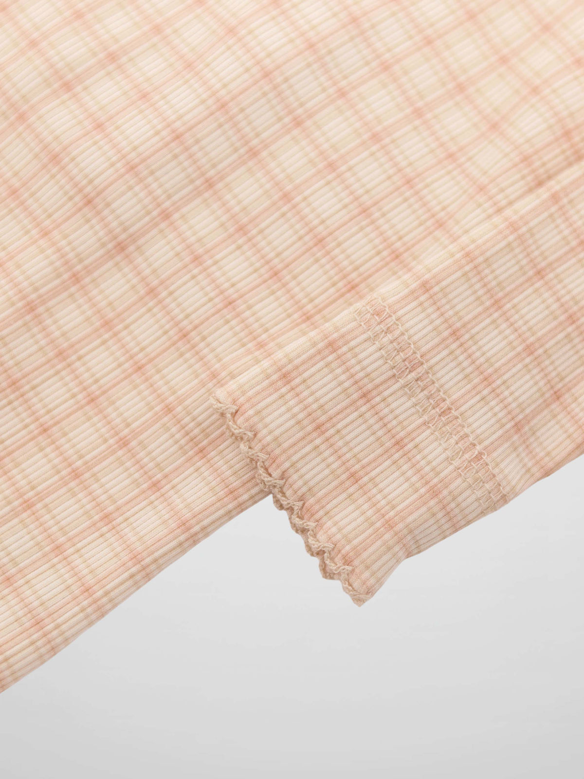 Oatmeal Grid Stretchy Pink girls stretchies fabric with plaid grid and elastic cuff