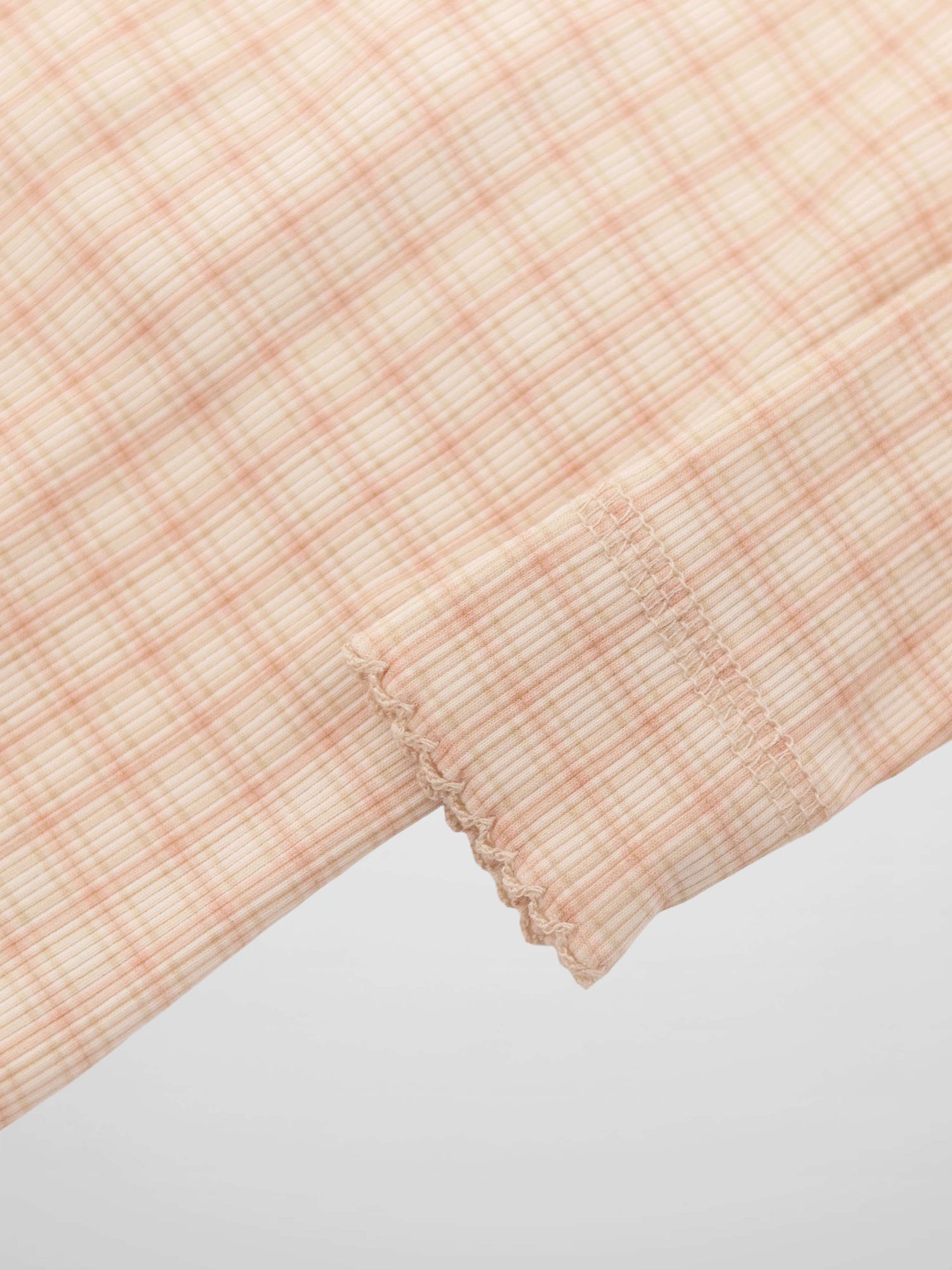 Oatmeal Grid Stretchy Pink girls stretchies fabric with plaid grid and elastic cuff