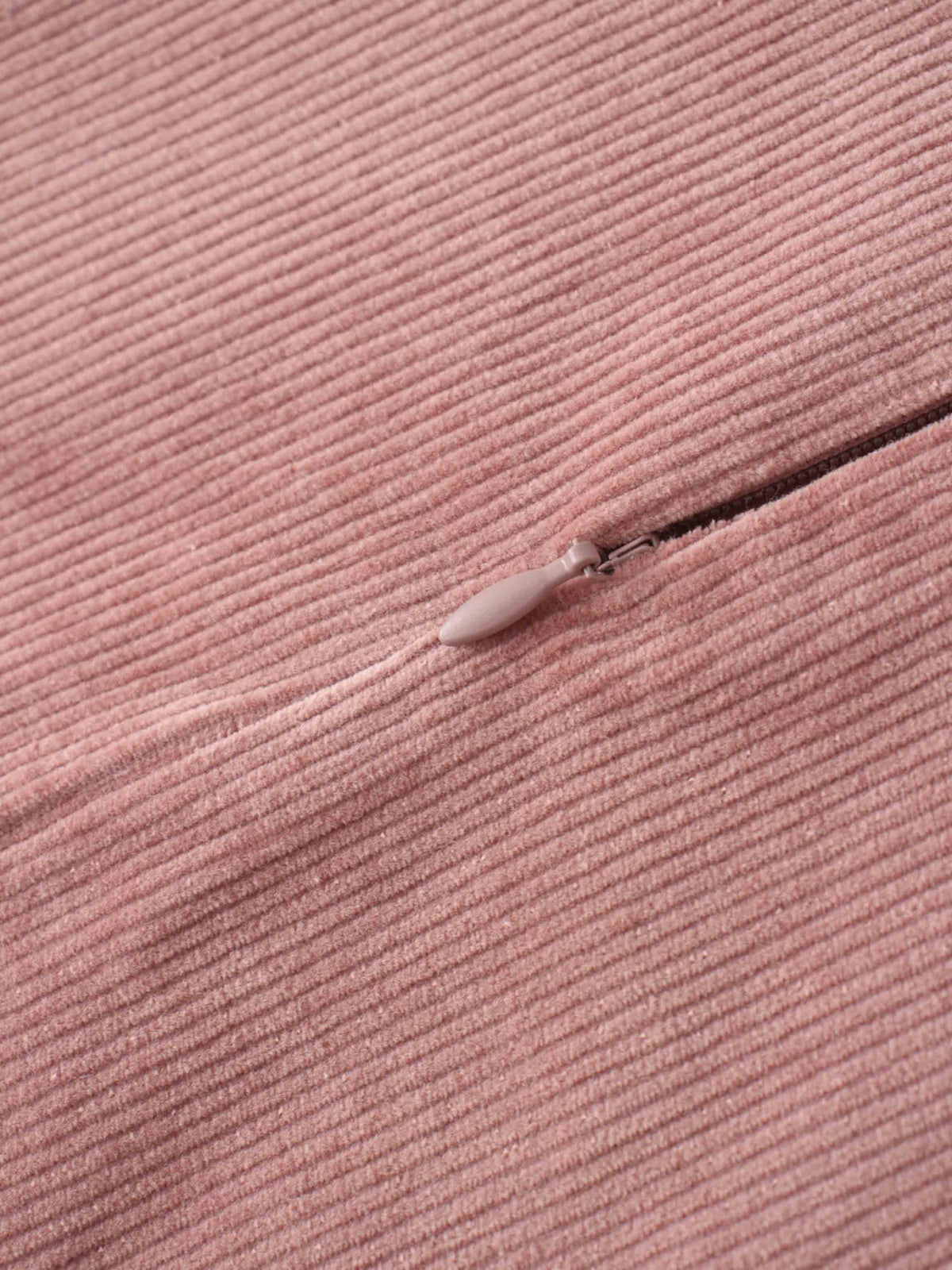 Mauve corduroy jumper fabric with zipper pull