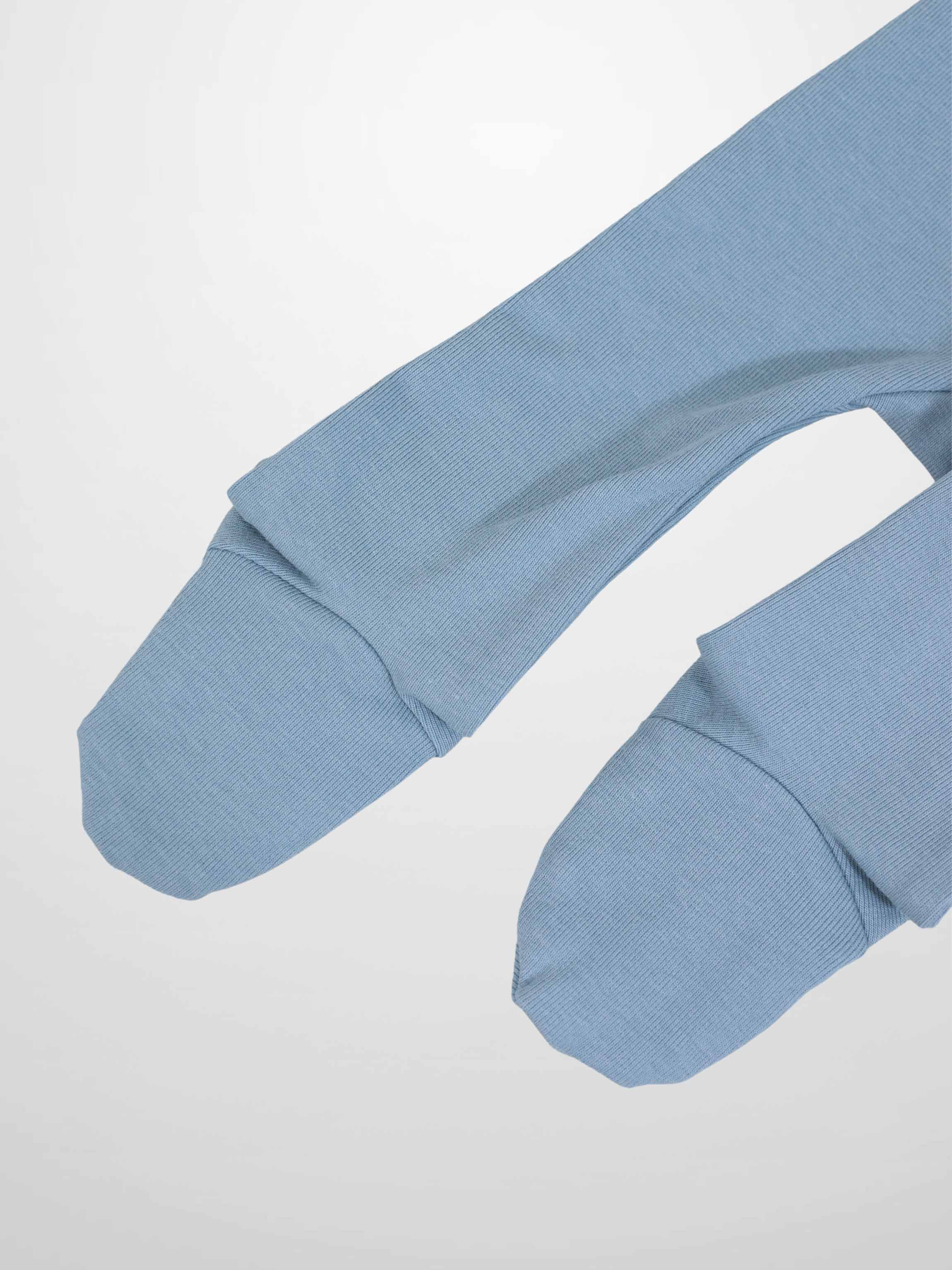 Blue Anchor Stretchy baby jumpsuit footie with white rope loops and central anchor.