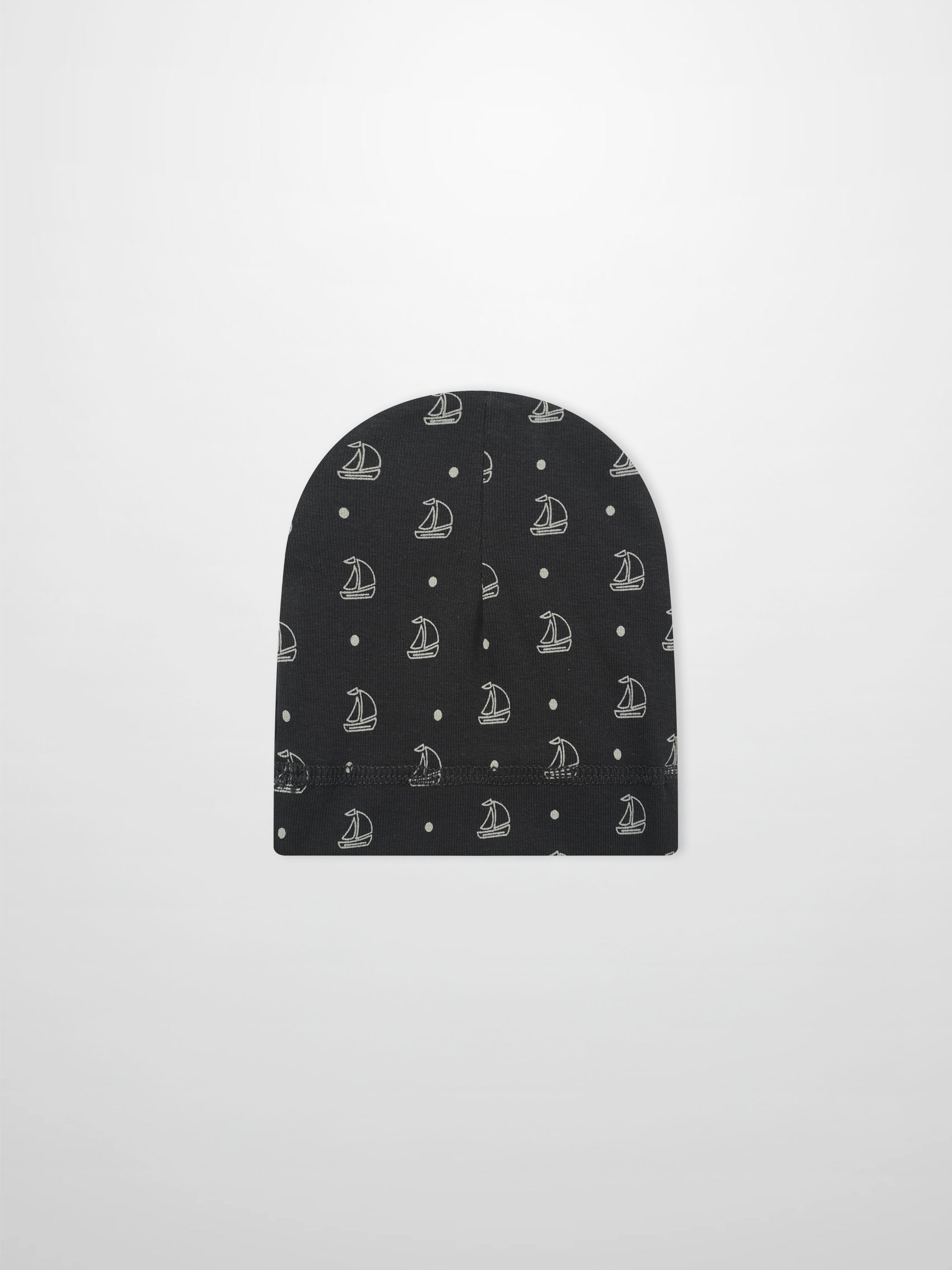 Harbor Dot Hat by Adee; navy blue boys beanie featuring white sailboats and small dot repeating pattern
