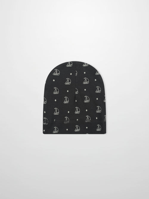 Harbor Dot Hat by Adee; navy blue boys beanie featuring white sailboats and small dot repeating pattern