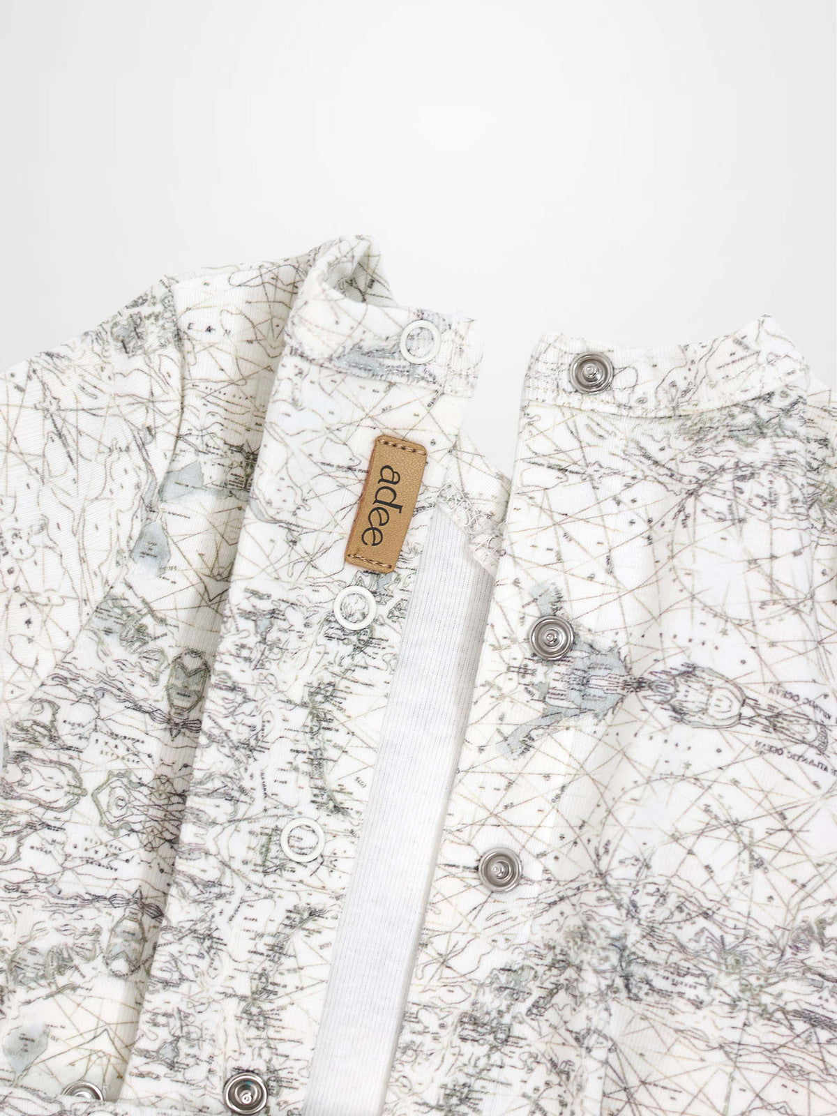 Map Stretchy boys stretchies in finely sketched sage green map-print fabric by Adee