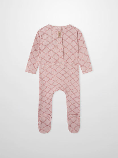Pink Leaf Stretchy; Adee girls stretchies in pink with lattice leaf pattern, footed one-piece.