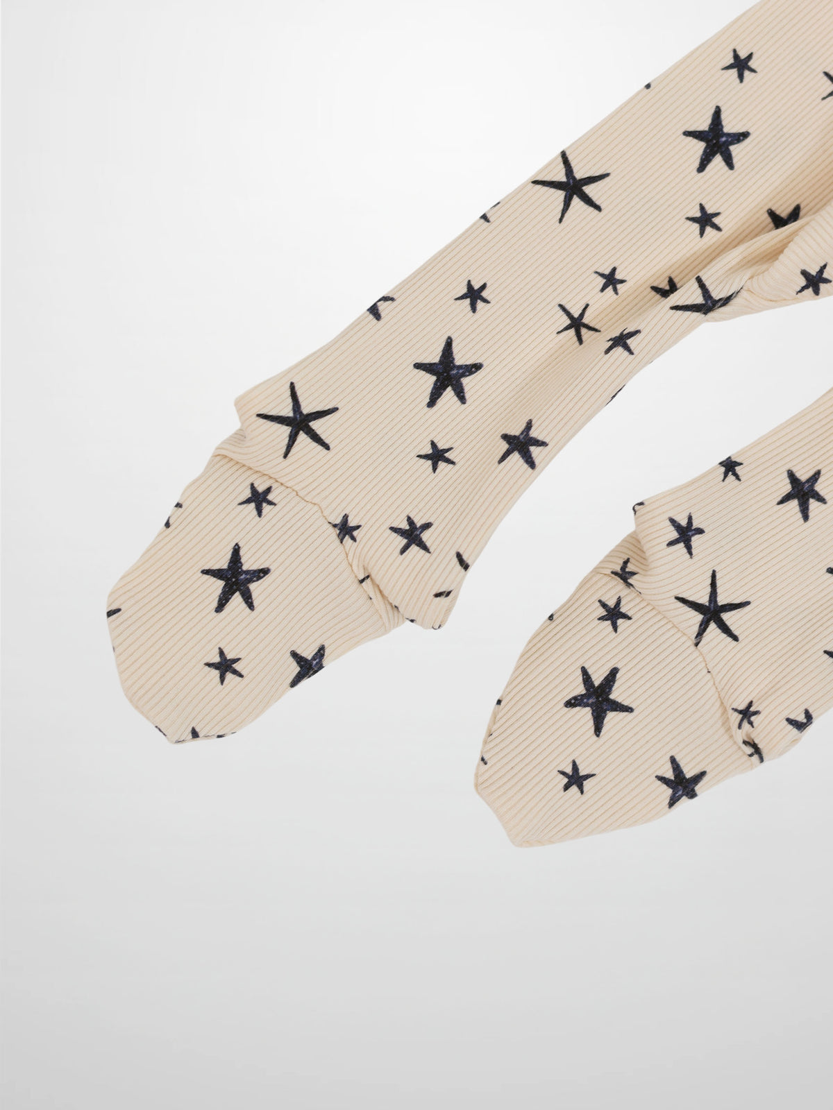 Star Stretchy by Adee in beige ribbed fabric with navy star print