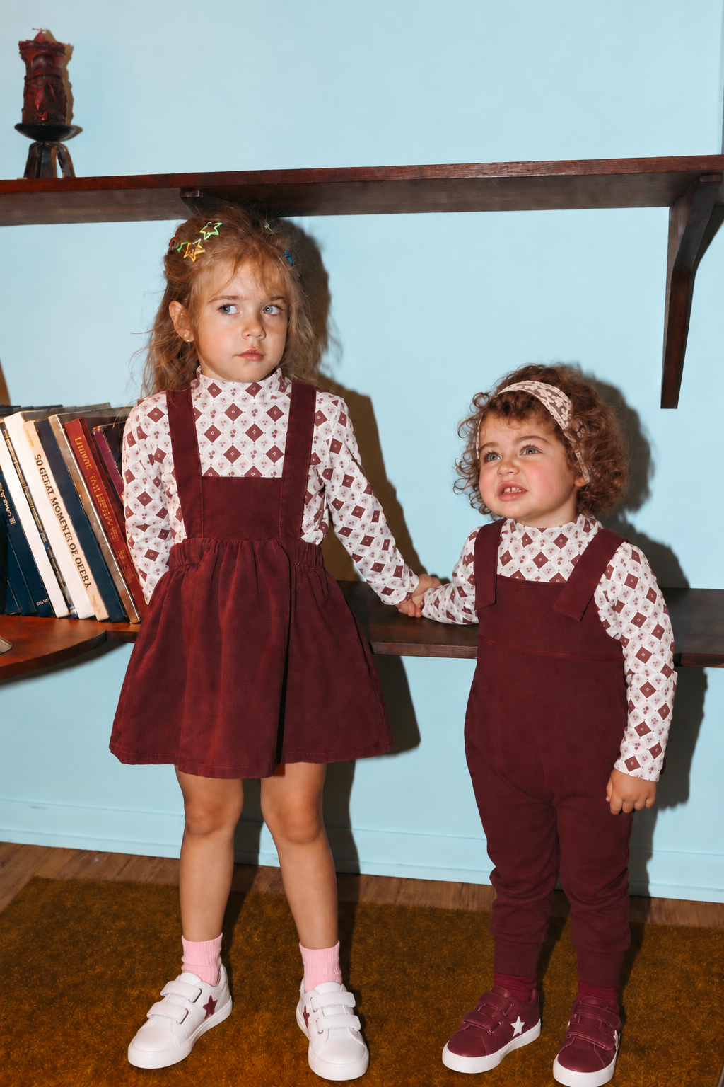 Mosaic Floral Mock Neck T-Shirt; two girls in burgundy outfits with white patterned tops.