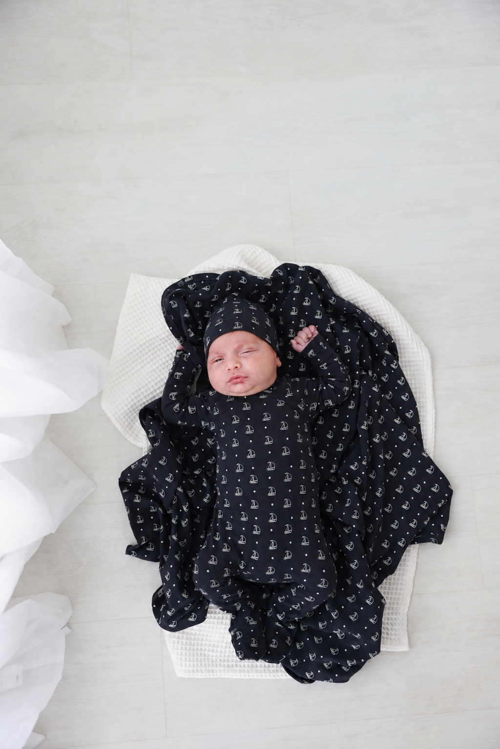 Harbor Dot Stretchy boys stretchies: navy fabric with white sailboat print by Adee.