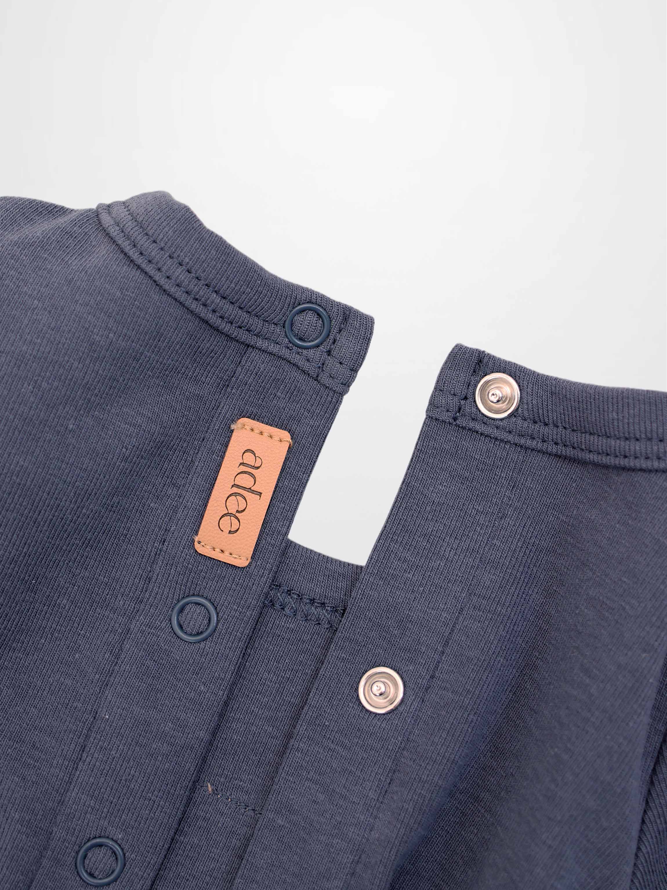 Teddy Frame Stretchy boys stretchy romper in navy with snap closures and Adee label