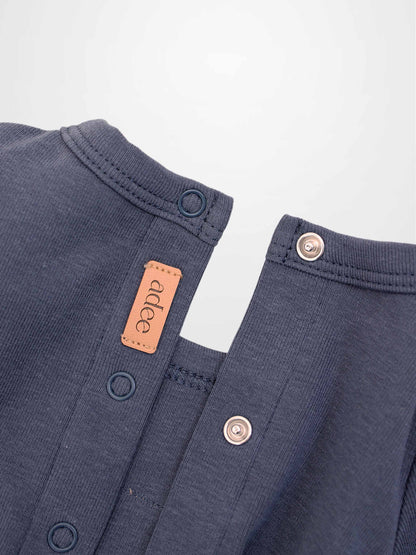 Teddy Frame Stretchy boys stretchy romper in navy with snap closures and Adee label