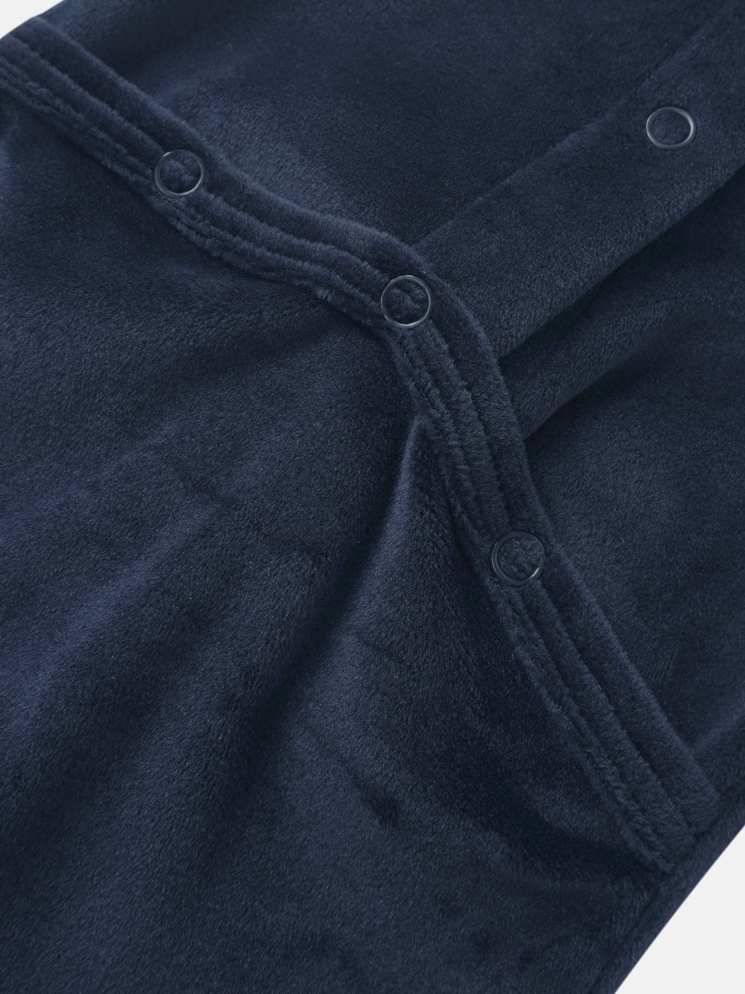 Embroidered Bear Stretchy navy fabric for boys with snap closures