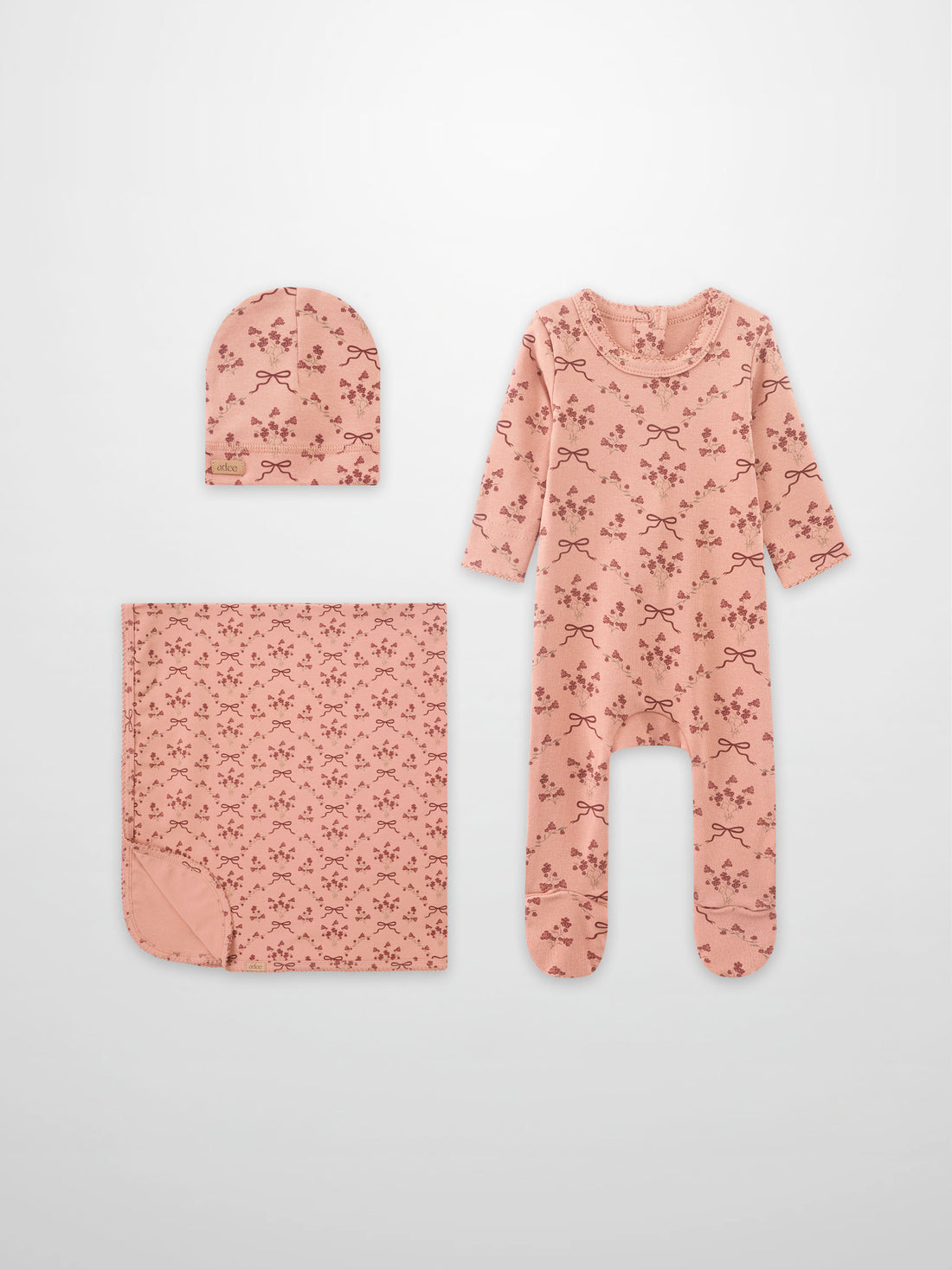Bow Bouquet girls layette set by Adee in pink with floral bows; includes hat, blanket, romper.