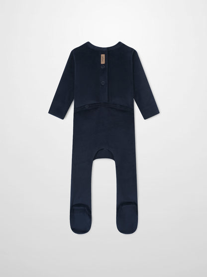 Adee Embroidered Bear Stretchy Navy boys romper; back view shows beige brand tag.