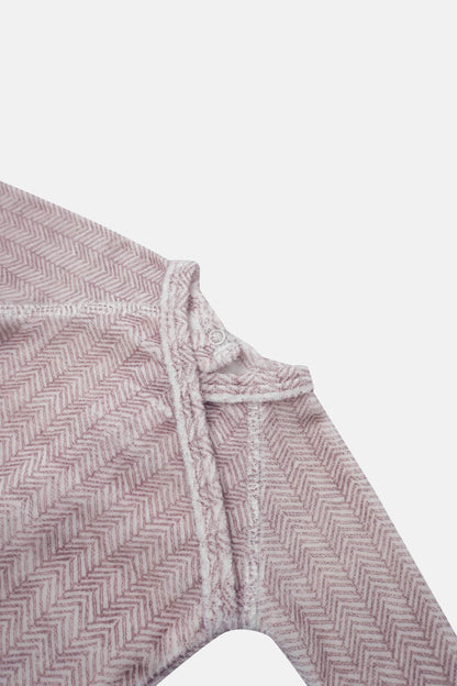 Heritage Herringbone Red layette set by Adee for girls with pink-red herringbone fabric, snap closures, and soft lining.