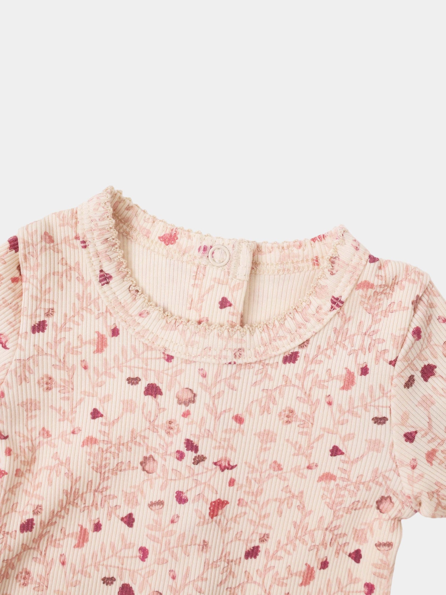 Adee Garden Sprinkles Stretchy girls top in pink floral striped fabric with a ruffled collar and back button.