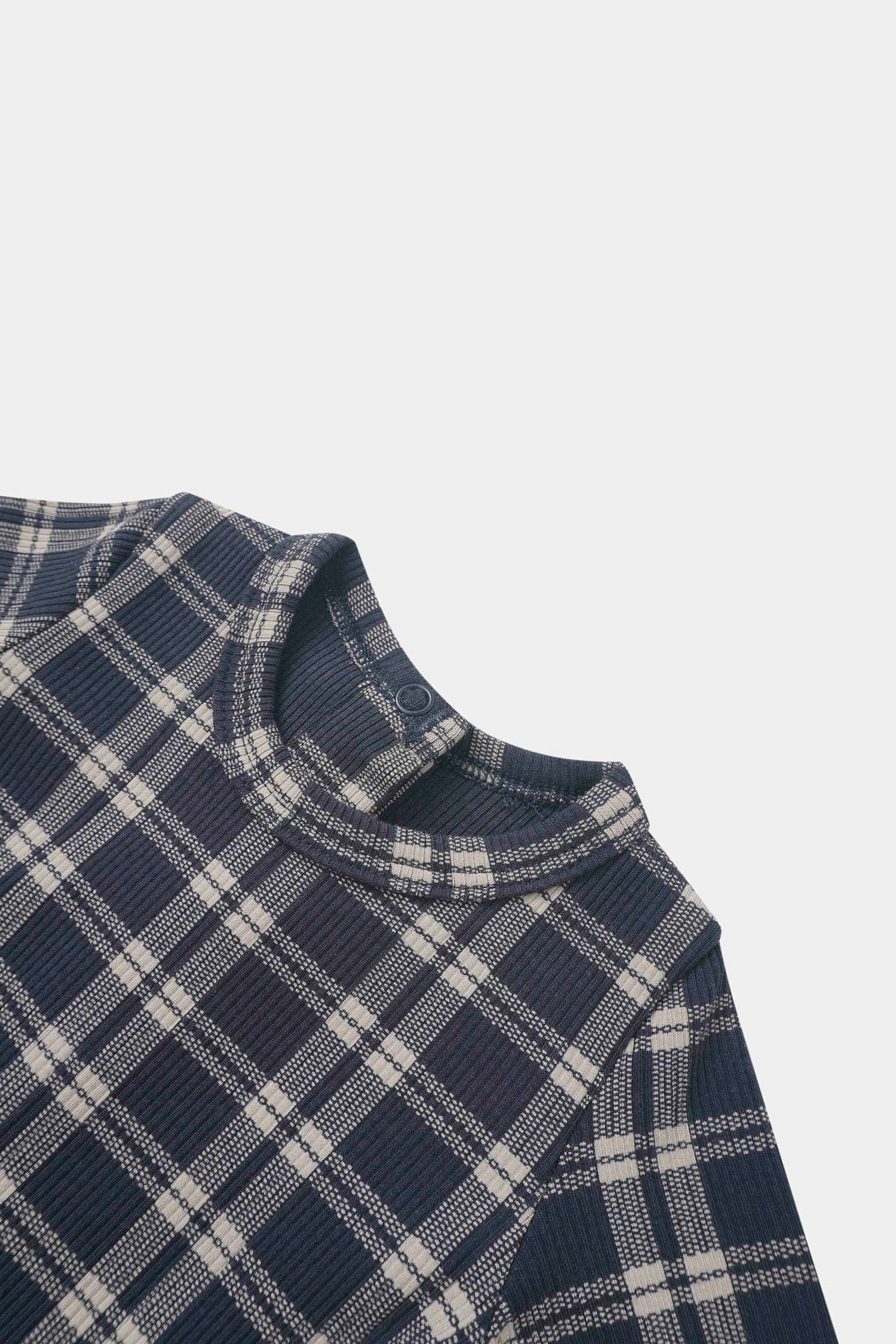 Navy plaid layette set top for boys by Adee, with ribbed collar.