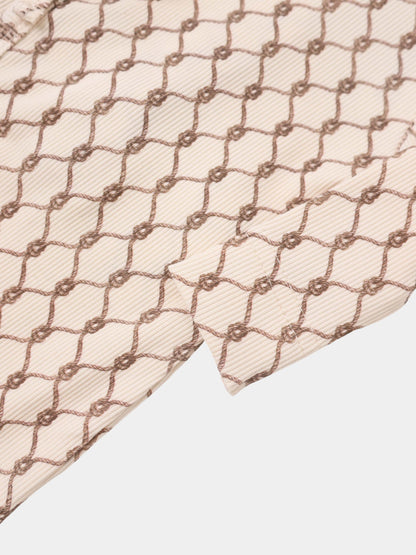 Brown Chain Stretchy; Adee boys stretchies fabric with beige base and brown chain-link pattern.
