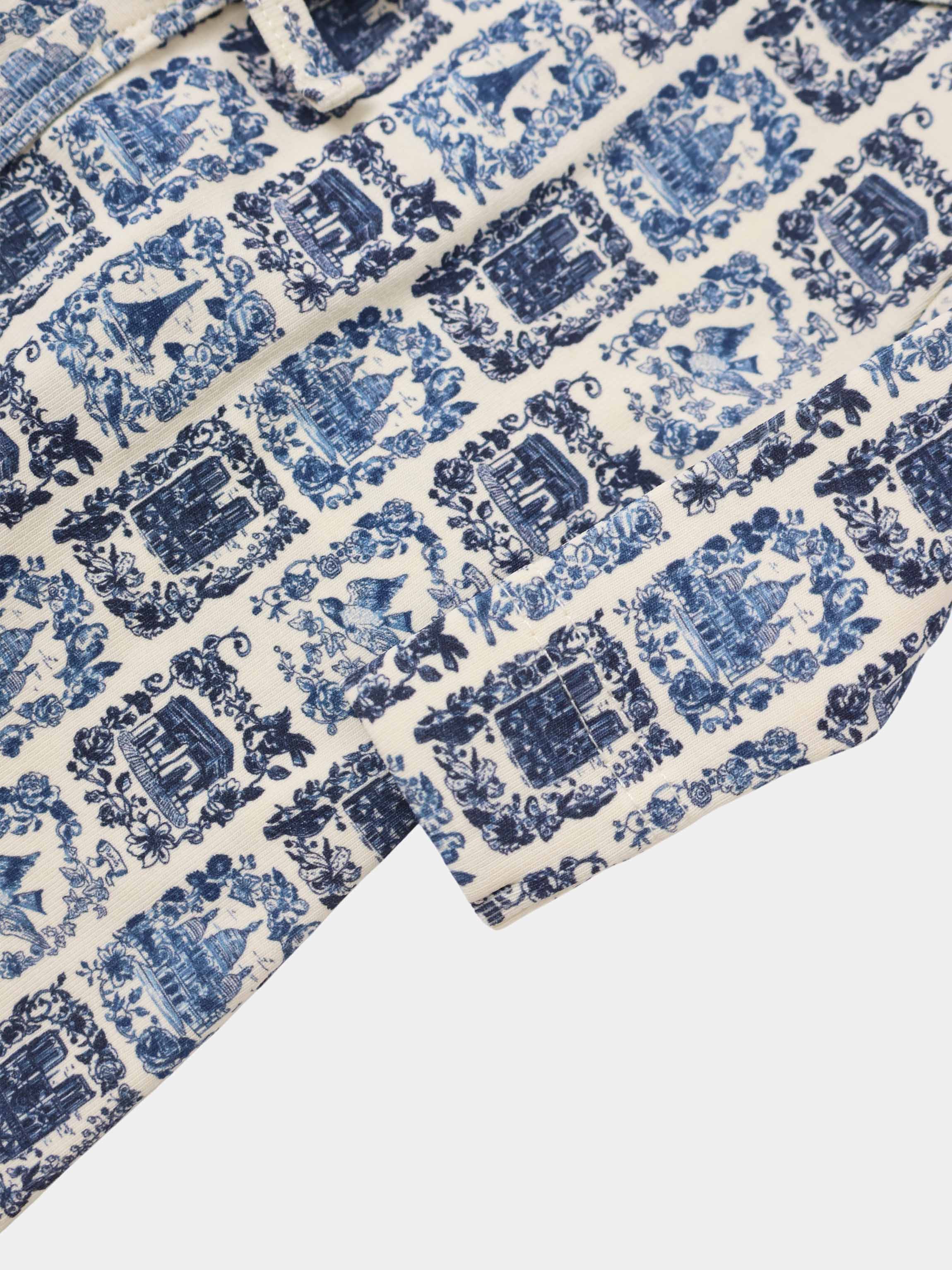 Blue Landmark Stretchy for boys by Adee; blue toile pattern on cream fabric.