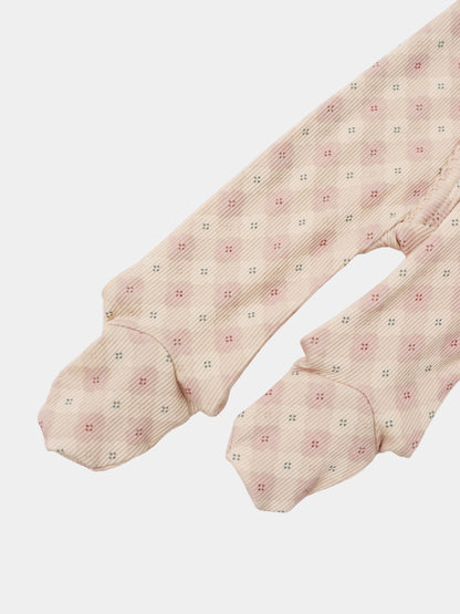 Little Button Stretchy pink girls stretchies with a small dotted pattern and ribbed cuffs.