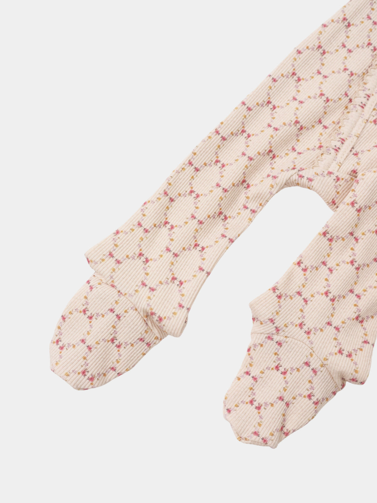 Adee Floral Garland Stretchy girls’ knit top with beige ribbed fabric and pink floral pattern.