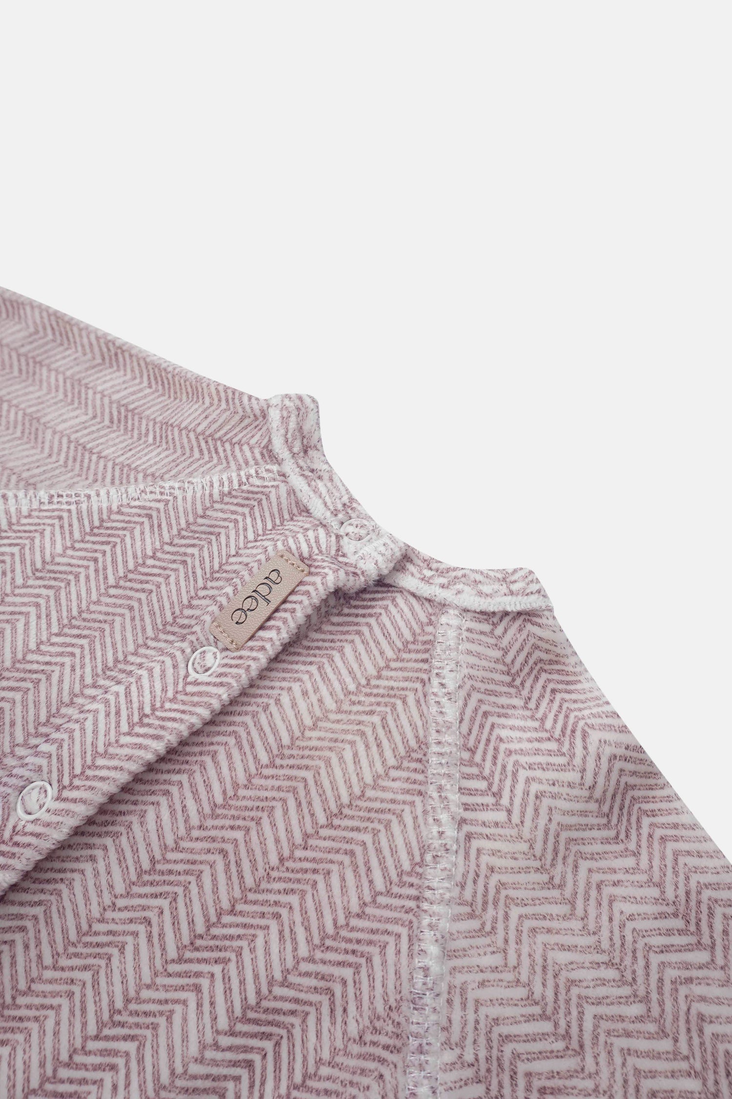 Heritage Herringbone Stretchy girls top by Adee in pink-red herringbone fabric with front snaps