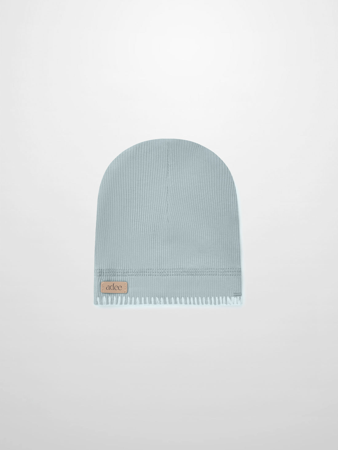 Legacy Stitch Hat by Adee in light blue knit for boys; ribbed cuff with leather patch.