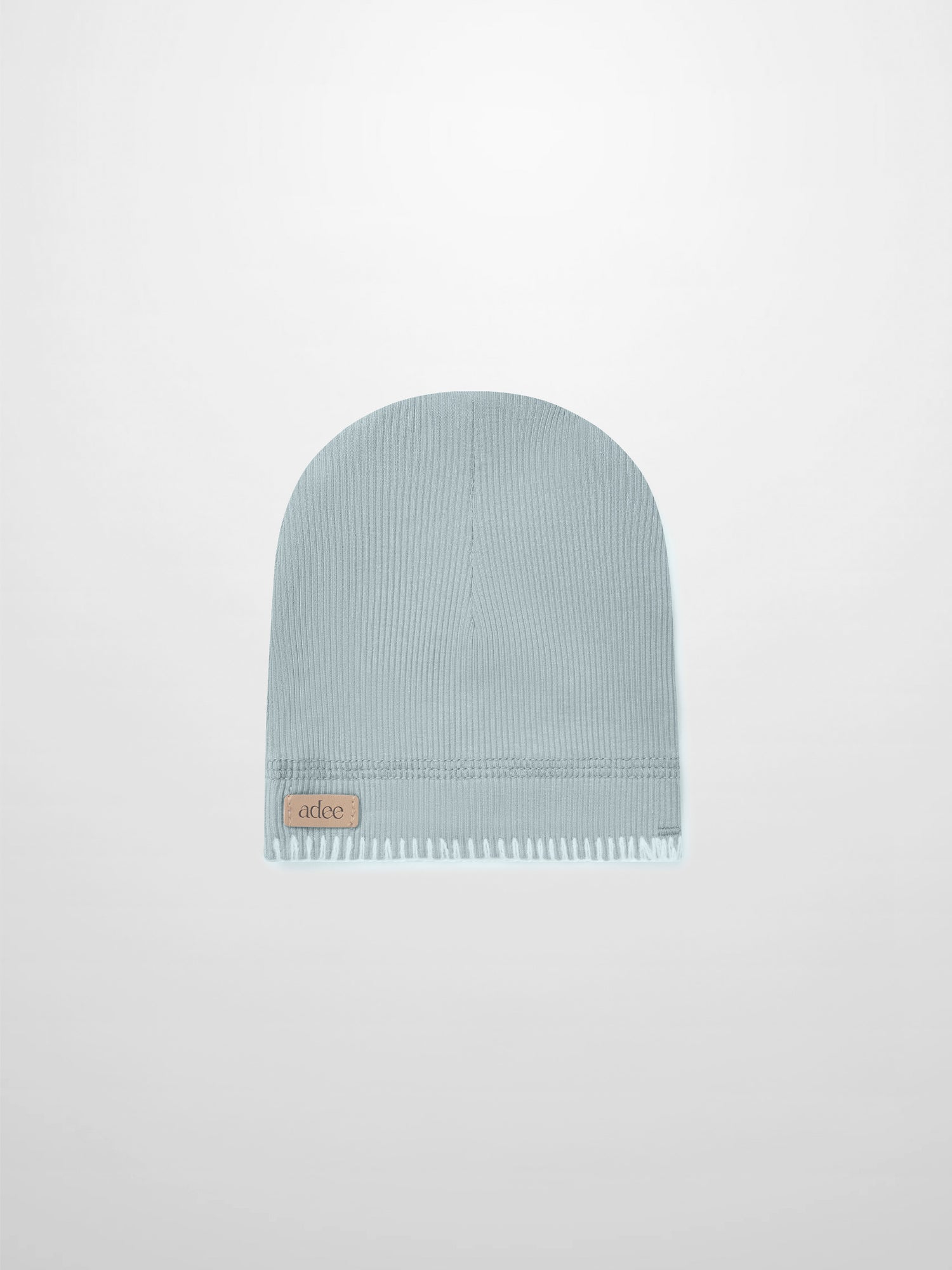 Legacy Stitch Hat by Adee in light blue knit for boys; ribbed cuff with leather patch.